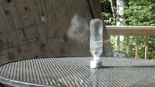 Slow mo bottle blow