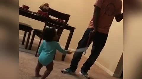 Awesome Dad Engages His Toddler Daughter In An Epic Sword Fight