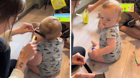 Lots Of Distractions Needed For Baby's First Haircut