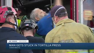 Man gets hand stuck in an industrial tortilla press