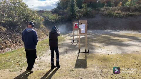 Shooting a 9mm H&K at the shooting range