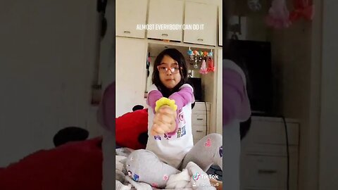 Cute baby girl is doing a trick with her hands- can you do it?