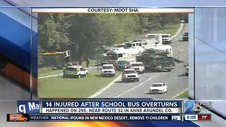 14 injured in overturned bus crash