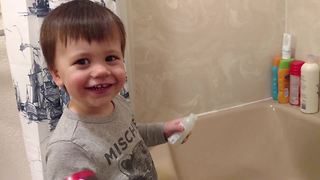 A Tot Boy Gets Very Excited About Taking A Bath