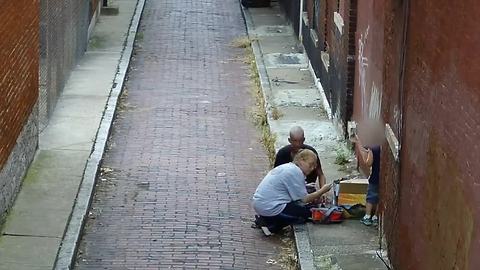 VIDEO: Mom shoots up in Over-the-Rhine alley with toddler (child's face blurred)