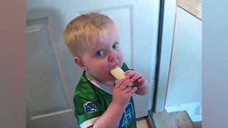 "Cute Tot Boy Eats Banana in Almost One Bite"