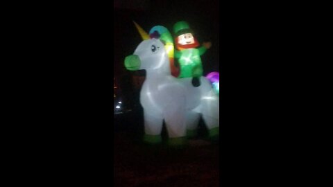 Leprechaun riding a unicorn