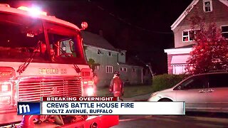 Crews battle house fire near Broadway and Fillmore Avenue