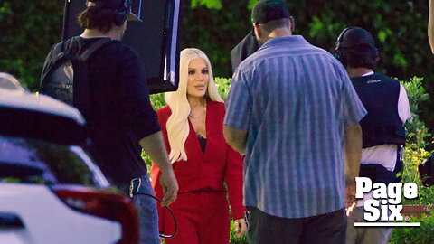 Tori Spelling returns to work in striking red pantsuit after family's RV stay