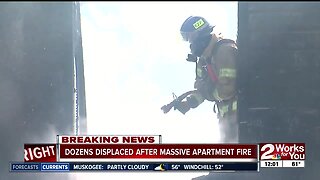 Dozens displaced after massive apartment fire