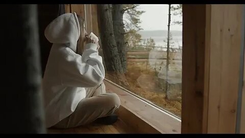 Woman in a Hoodie Watching Through the Window - No Copyright Video