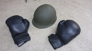 Shredding German army helmet and boxing gloves