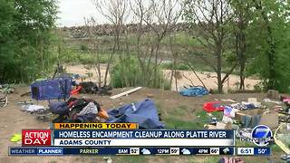 Crews clean up homeless camps along banks of S. Platte River in Denver