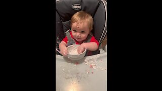 Do you think this baby likes yogurt?