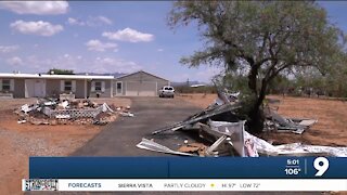 Microburst rips patio over house into front yard