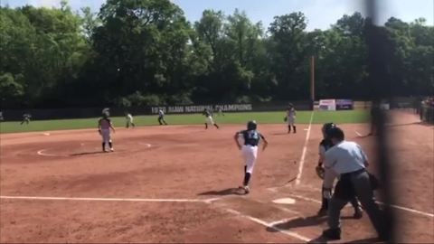 Young woman powers through using softball after suffering stroke