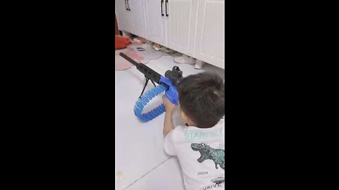 A little boy playing with toys