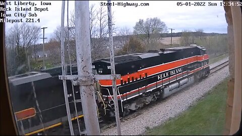 WB IAIS "BICB" Manifest with IAIS 513 "Rock Island" at West Liberty Depot on May 1, 2022