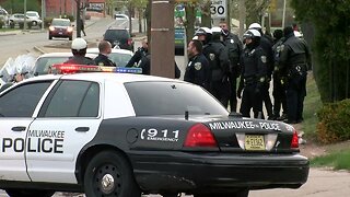 Man shot by police accused of killing woman at Walgreens