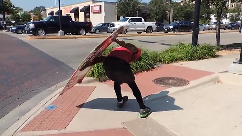 Sign Spinner Shows Incredible Skills And Takes Advertising To The Next Level