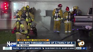 Family of 8 flees from home after garage fire