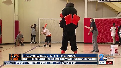 Baltimore students spend the day playing with Orioles players