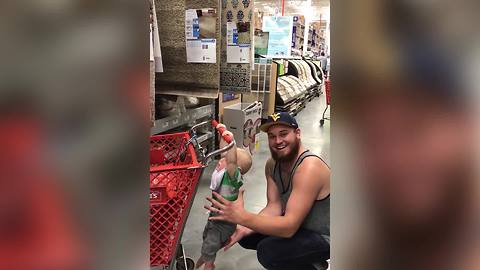 Guy In Supermarket Has A Great Fun With His Baby