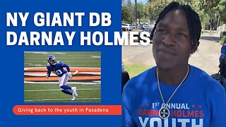 NFL Player Darnay Holmes giving back to the community.