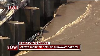 Loose barges hit Webbers Falls dam