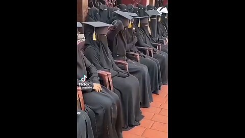 Can you find your daughter in this graduation ceremony? Hint: I think she's wearing black...