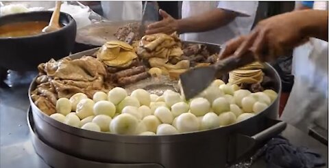 Massive batch of tacos being prepared for tourists in Patzcuaro, Mexico