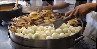 Massive batch of tacos being prepared for tourists in Patzcuaro, Mexico