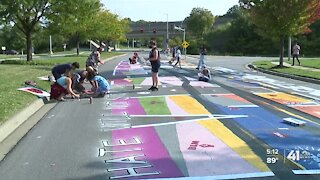 Artists incorporate tire tracks into Black Live Matter road mural