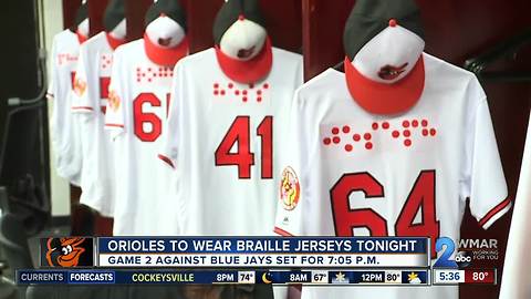 Orioles make history with Braille jerseys