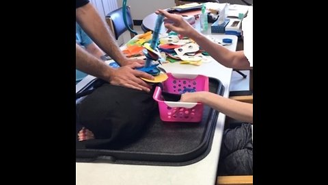 Vibrating Ring Stack and Stringing Activity for Developmental Disabilities