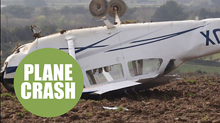 Pilot has miracle escape after crashing his plane upside down into a field