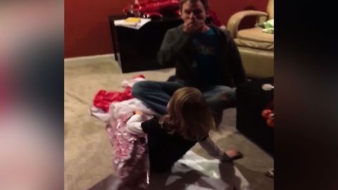 Dad Unwraps A Shocking Gift