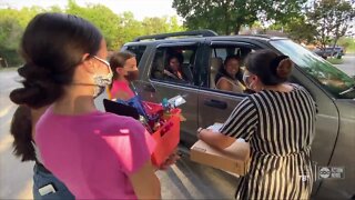 Community holds drive-thru celebration for high school graduates