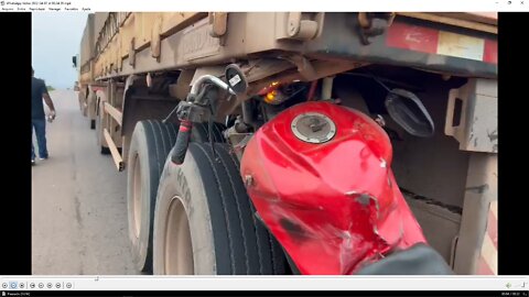 incredible accident, motorbike dragged by a truck