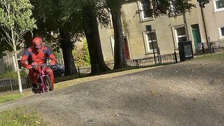 Deadpool rides kids bike