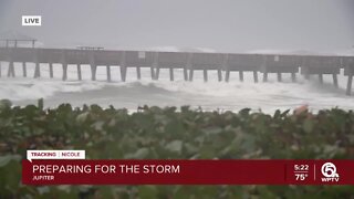 Waves from Tropical Storm Nicole batter Juno Beach Pier