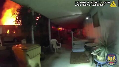 Body camera video shows Phoenix officers help man, dog escape house fire