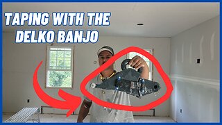 One of many WEAPONS for hand taping Drywall- Delko Banjo