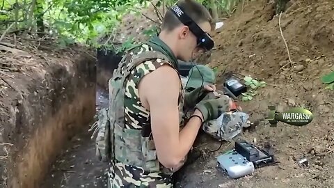 Russian FPV drone pilot at work from a trench