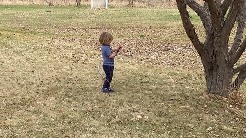 My Awesome Helper at work keeping the grass watered