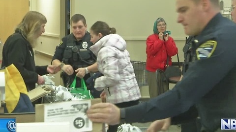 Manitowoc Police try to stuff a squad car