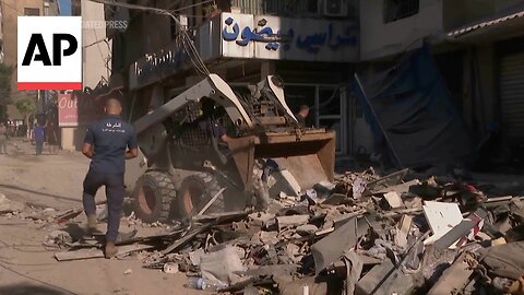 Morning scene by building in Beirut suburb hit by Israeli strike targeting Hezbollah commander