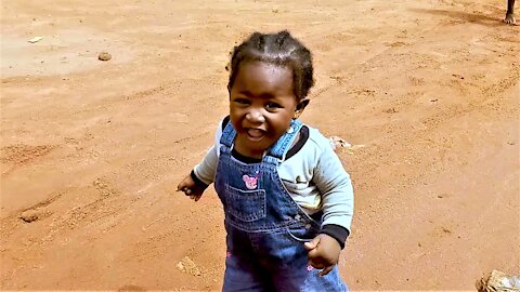 Adorable baby taking her first steps will melt your heart