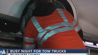 Tow truck drivers stay busy during snow storm