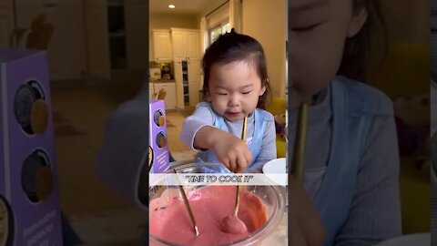 Toddler tries to make pink unicorn waffles for breakfast